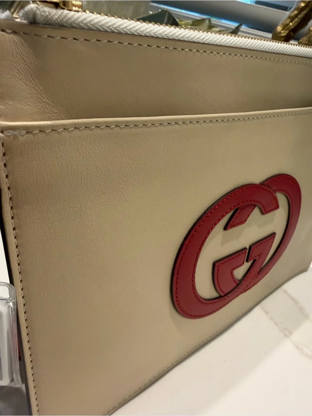 Authentic Gucci Cream Leather Zip Pouch with Red Double G Logo
